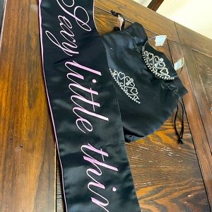 Beautiful tiara, with cross body band “sexy little thing “ reading